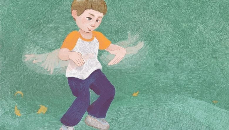 Imagen de un niño aleteando las manos, estereotipia muy común en niños con autismo.